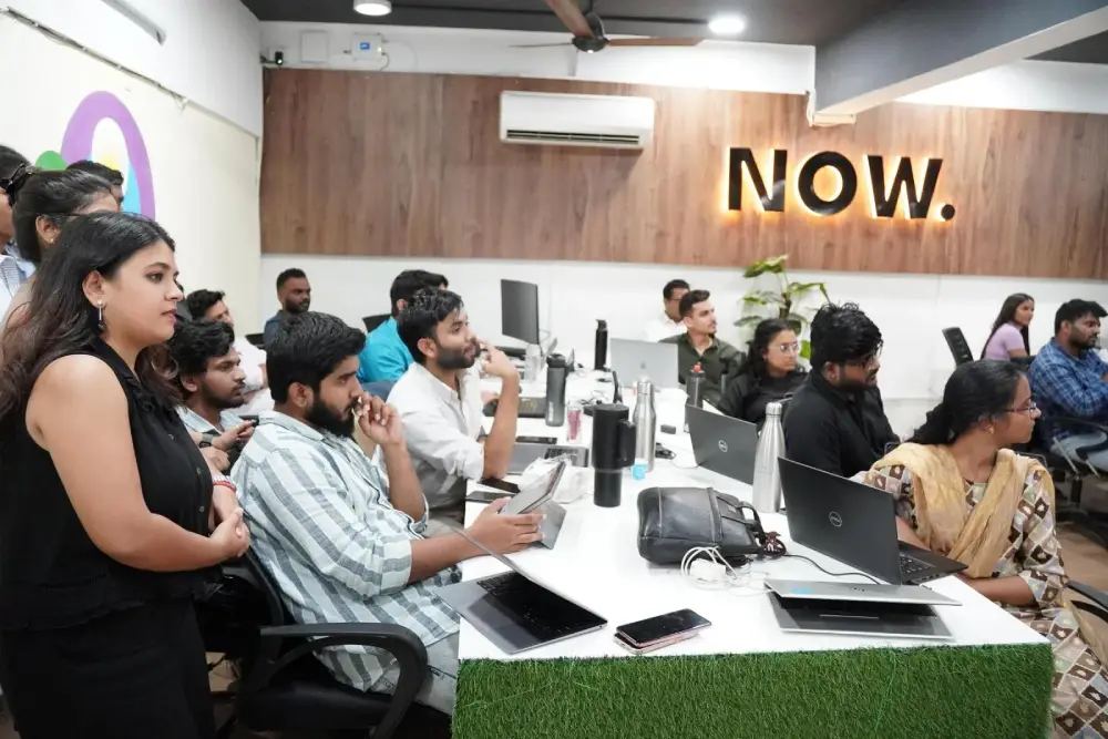Digital marketing team training session at Digital Mojo office in Hyderabad with professionals working on laptops